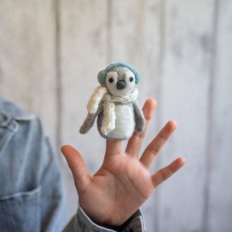 vingerpopje pinguïn ijsblauw hand