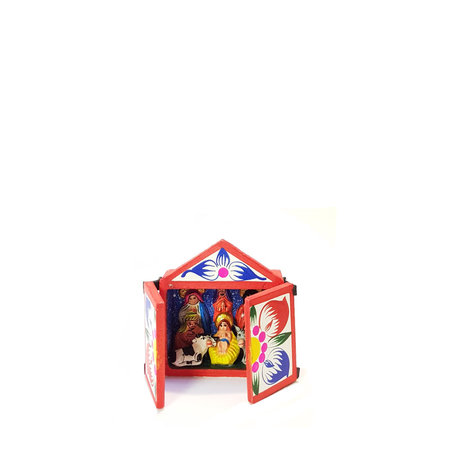 Kerstgroep in een houten huisje
