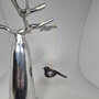 Troostvogel hangend zwart