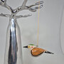 Troostvogel hangend groen hoofd